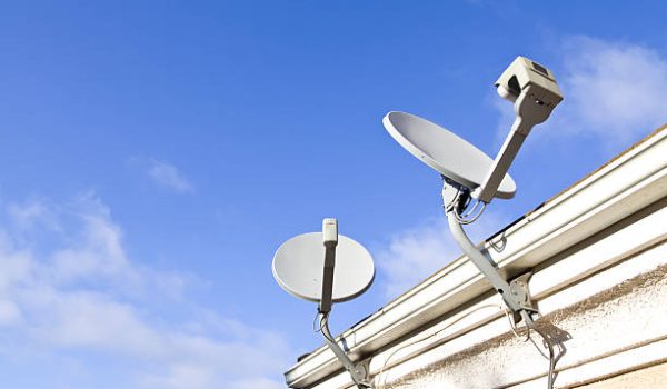 Home Satellite Dish connected to house.