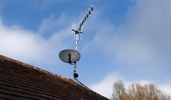 a tv arial and satellite dish