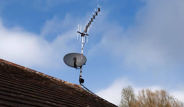 a tv arial and satellite dish